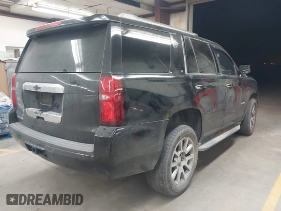 2015 Chevrolet Tahoe LT z VIN 1GNSCBKC1FR228488, wystawiony jako IAAI lot #41933869 z przebiegiem 164 523 mil mil oraz . Historia ofert i sprzedaży dostępna na DreamBid. Obrazek 4.