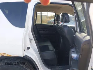 2014 Jeep Compass Latitude with VIN 1C4NJDEB8ED622012, listed as a IAAI auction lot 41917126 with 143,065 mi miles. Bid and sale history available at carsss.com. Image 8.