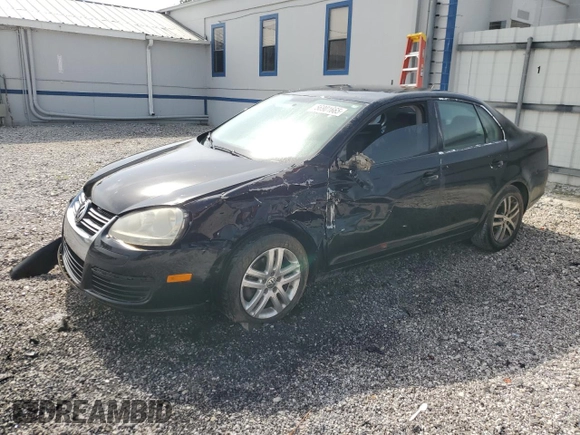 2009 Volkswagen Jetta S z VIN 3VWJM71K39M165677, wystawiony jako Copart lot #56901665 z przebiegiem 202 632 mil mil oraz Czysty tytuł • Clean title. Historia ofert i sprzedaży dostępna na DreamBid. Obrazek 1.
