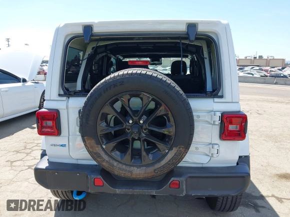 2024 Jeep Wrangler Sahara with VIN 1C4RJXP61RW126904, listed as a IAAI auction lot 41998215 with 32,034 mi miles and . Bid and sale history available at DreamBid. Image 16.