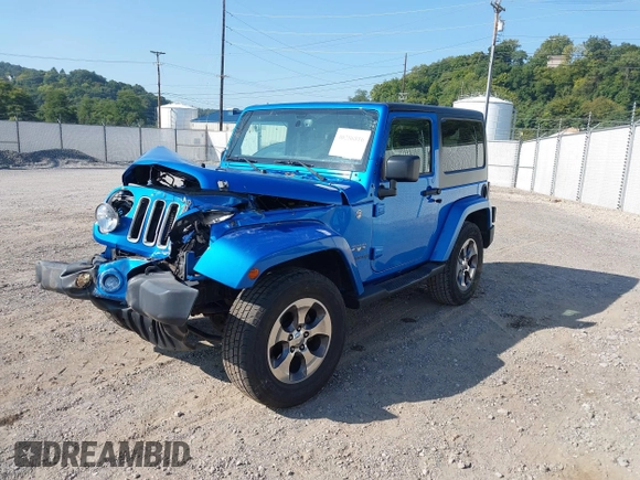 2016 Jeep Wrangler Sahara with VIN 1C4AJWBG9GL112139, listed as a IAAI auction lot 40286816 with 54,568 mi miles and . Bid and sale history available at DreamBid. Image 2.