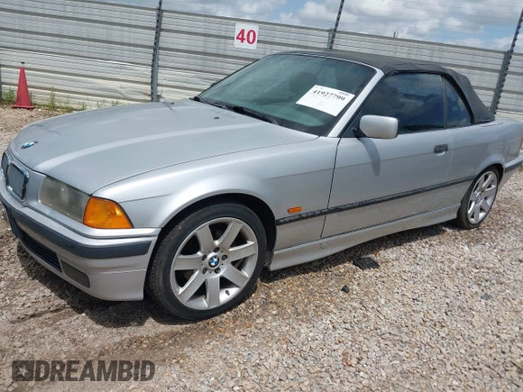 1998 BMW 3 Series 323icA with VIN WBABJ8334WEM22565, listed as a IAAI auction lot 41927799 with 165,077 mi miles. Bid and sale history available at carsss.com. Image 2.