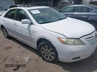 2007 Toyota Camry LE z VIN 4T1BK46K97U507609, wystawiony jako IAAI lot #42400776 z przebiegiem 206 684 mil mil oraz . Historia ofert i sprzedaży dostępna na DreamBid. Obrazek 1.