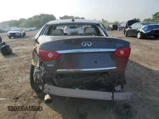 2014 Infiniti Q50 Premium with VIN JN1BV7ARXEM680167, listed as a Copart auction lot 59702095 with 108,196 mi miles and Salvage title. Bid and sale history available at DreamBid. Image 6.