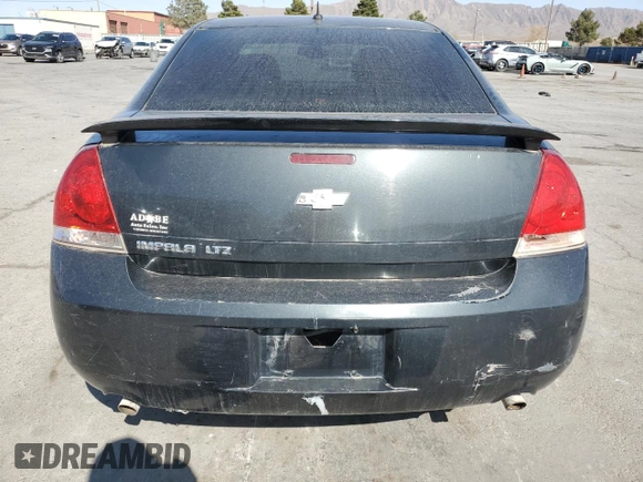 2013 Chevrolet Impala LTZ with VIN 2G1WC5E36D1227326, listed as a Copart auction lot 52451975 with 195,479 mi miles and Clean Title. Bid and sale history available at DreamBid. Image 6.