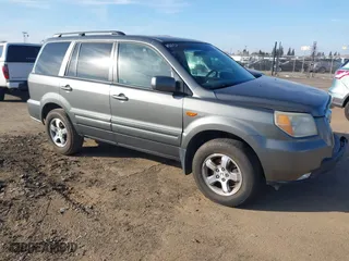 2007 Honda Pilot EX-L with VIN 5FNYF28797B001772, listed as a IAAI auction lot 41320270 with 220,227 mi miles. Bid and sale history available at carsss.com. Image 1.