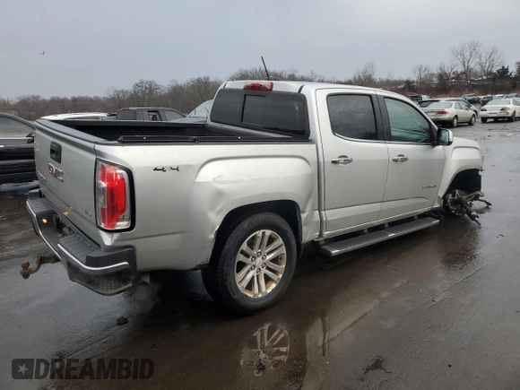 2015 GMC Canyon 4WD SLT with VIN 1GTG6CE35F1251486, listed as a Copart auction lot 46884015 with 162,144 mi miles and Salvage Title. Bid and sale history available at carsss.com. Image 3.
