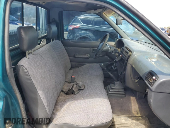1997 Nissan Frontier XE with VIN 1N6SD11SXVC332100, listed as a Copart auction lot 54330245 with 203,959 mi miles and Salvage title. Bid and sale history available at DreamBid. Image 10.