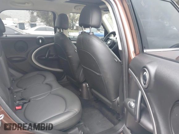 2013 MINI Countryman with VIN WMWZB3C56DWM09484, listed as a IAAI auction lot 42039954 with 37,264 mi miles and . Bid and sale history available at DreamBid. Image 8.