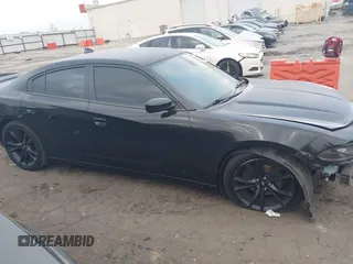 2018 Dodge Charger SXT Plus with VIN 2C3CDXHG3JH323343, listed as a IAAI auction lot 41948905 with 158,543 mi miles and . Bid and sale history available at carsss.com. Image 14.