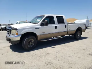 2002 Ford F-350 XL с VIN 1FTSW31F52EC95663, выставлен на аукционе Copart как лот 61106125 с пробегом Не указан миль и Списание • Salvage title. История ставок и продаж доступна на DreamBid. Изображение 1.