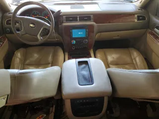 2010 Chevrolet Suburban LTZ with VIN 1GNUCKE09AR146804, listed as a Copart auction lot 56639764 with 210,705 mi miles and Salvage Title. Bid and sale history available at carsss.com. Image 8.