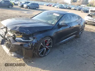 2022 Audi RS 7 z VIN WUAPCBF22NN905234, wystawiony jako Copart lot #82685364 z przebiegiem 27 598 mil mil oraz Szkody całkowita. Historia ofert i sprzedaży dostępna na DreamBid. Obrazek 1.