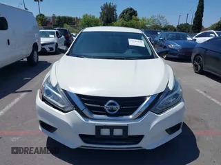 2017 Nissan Altima SV with VIN 1N4AL3AP2HC292095, listed as a IAAI auction lot 42145110 with 85,739 mi miles and . Bid and sale history available at carsss.com. Image 12.