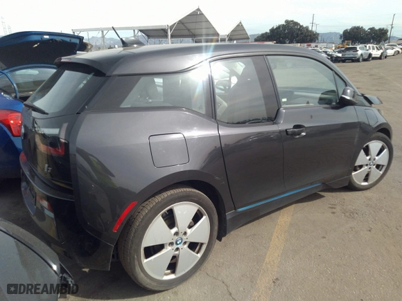 2014 BMW i3 with VIN WBY1Z4C53EV272852, listed as a IAAI auction lot 40131624 with 38,490 mi miles. Bid and sale history available at carsss.com. Image 4.