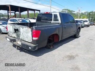 2012 Nissan Titan S with VIN 1N6AA0EJ0CN316084, listed as a IAAI auction lot 41666607 with 138,655 mi miles. Bid and sale history available at carsss.com. Image 4.