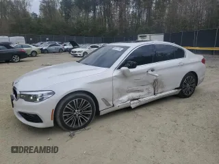 2018 BMW 5 Series 540i xDrive with VIN WBAJE7C54JG891048, listed as a Copart auction lot 59943605 with 99,105 mi miles and Salvage title. Bid and sale history available at DreamBid. Image 1.