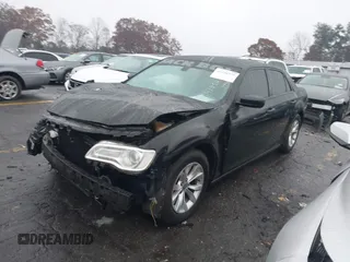 2015 Chrysler 300 Limited with VIN 2C3CCAAG8FH807168, listed as a IAAI auction lot 41056399 with Not Provided miles. Bid and sale history available at carsss.com. Image 2.