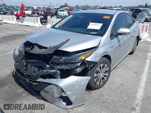 2021 Toyota Prius LE with VIN JTDKAMFP1M3180370, listed as a IAAI auction lot 41928512 with 83,249 mi miles and . Bid and sale history available at DreamBid. Image 2.