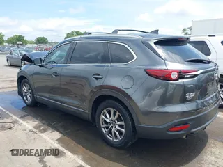 2019 Mazda CX-9 Touring with VIN JM3TCACY6K0334085, listed as a IAAI auction lot 42391595 with 113,723 mi miles and . Bid and sale history available at DreamBid. Image 14.
