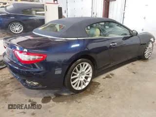 2015 Maserati GranTurismo Convertible Sport with VIN ZAM45MMA5F0141129, listed as a IAAI auction lot 41538585 with 11,267 mi miles. Bid and sale history available at carsss.com. Image 4.