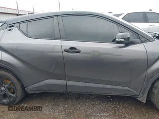 2021 Toyota C-HR LE with VIN JTNKHMBX0M1129080, listed as a IAAI auction lot 41321604 with 52,916 mi miles. Bid and sale history available at carsss.com. Image 13.
