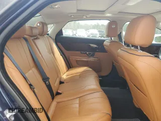 2015 Jaguar XJ Portfolio with VIN SAJWJ2GD8F8V84252, listed as a Copart auction lot 49313935 with 90,545 mi miles and Salvage title. Bid and sale history available at DreamBid. Image 10.
