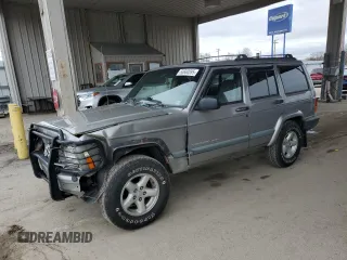 2000 Jeep Cherokee z VIN 1J4FF48S1YL224808, wystawiony jako Copart lot #50600595 z przebiegiem 193 592 mil mil oraz Szkody całkowita. Historia ofert i sprzedaży dostępna na DreamBid. Obrazek 1.