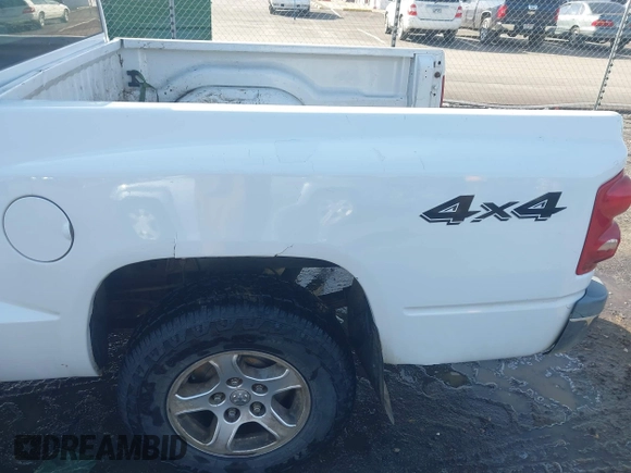 2005 Dodge Dakota SLT with VIN 1D7HW48N85S226460, listed as a IAAI auction lot 41568128 with 213,159 mi miles and . Bid and sale history available at carsss.com. Image 19.