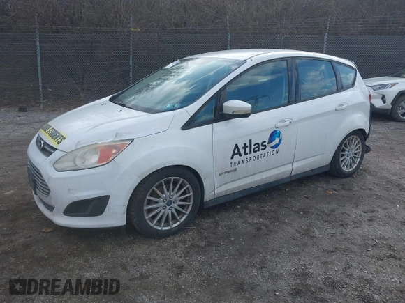 2013 Ford C-Max SE with VIN 1FADP5AU0DL516008, listed as a IAAI auction lot 41536951 with 209,923 mi miles. Bid and sale history available at carsss.com. Image 2.