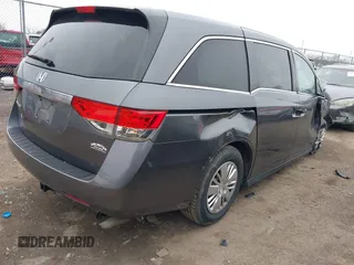 2015 Honda Odyssey LX z VIN 5FNRL5H21FB078427, wystawiony jako IAAI lot #42000305 z przebiegiem Nie podano mil oraz . Historia ofert i sprzedaży dostępna na DreamBid. Obrazek 4.