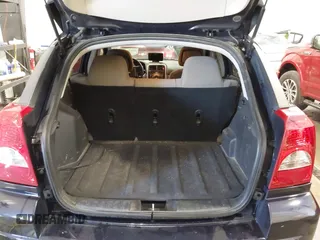2011 Dodge Caliber Mainstreet with VIN 1B3CB3HA2BD148279, listed as a IAAI auction lot 42150488 with 131,278 mi miles and . Bid and sale history available at DreamBid. Image 17.