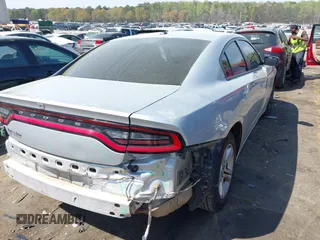 2019 Dodge Charger SXT with VIN 2C3CDXBG0KH572645, listed as a IAAI auction lot 41911868 with 119,024 mi miles. Bid and sale history available at carsss.com. Image 4.