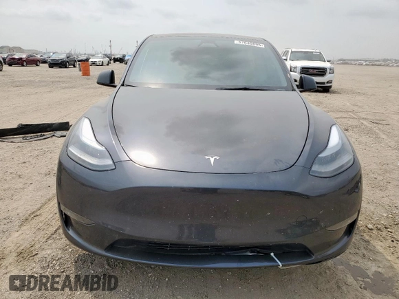 2024 Tesla Model Y Long Range with VIN 7SAYGDEE2RA287446, listed as a Copart auction lot 57640895 with 27,932 mi miles and Salvage title. Bid and sale history available at DreamBid. Image 5.