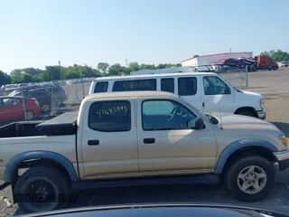 2002 Toyota Tacoma with VIN 5TEHN72NX2Z885767, listed as a IAAI auction lot 42643995 with 308,492 mi miles and . Bid and sale history available at DreamBid. Image 13.