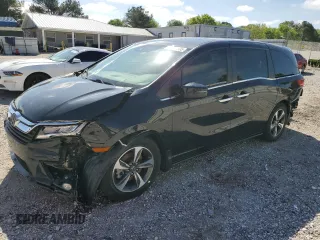 2019 Honda Odyssey Touring z VIN 5FNRL6H84KB014970, wystawiony jako Copart lot #53571835 z przebiegiem 116 219 mil mil oraz Szkoda całkowita • Salvage title. Historia ofert i sprzedaży dostępna na DreamBid. Obrazek 1.