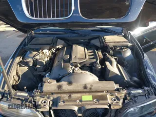 2000 BMW 5 Series 528iA with VIN WBADM6343YGU12629, listed as a IAAI auction lot 41963814 with 206,922 mi miles. Bid and sale history available at carsss.com. Image 10.