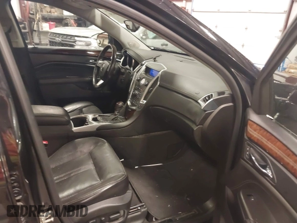 2012 Cadillac SRX Luxury Collection with VIN 3GYFNAE31CS645977, listed as a IAAI auction lot 41276810 with 133,071 mi miles. Bid and sale history available at carsss.com. Image 5.