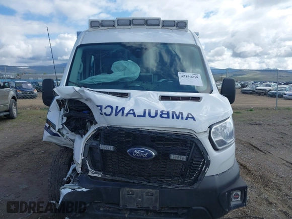 2022 Ford Transit z VIN 1FDBR1CG6NKA76214, wystawiony jako IAAI lot #42150218 z przebiegiem Nie podano mil oraz . Historia ofert i sprzedaży dostępna na DreamBid. Obrazek 13.