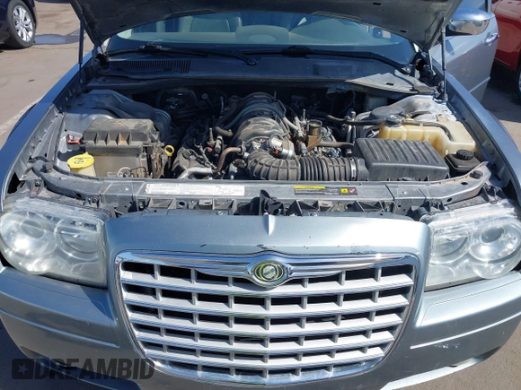 2006 Chrysler 300 C with VIN 2C3KA63H56H313967, listed as a IAAI auction lot 42056998 with 143,592 mi miles and . Bid and sale history available at carsss.com. Image 10.