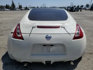2012 Nissan 370Z z VIN JN1AZ4EH1CM562134, wystawiony jako Copart lot #56708065 z przebiegiem Nie podano mil oraz Szkoda całkowita • Salvage title. Historia ofert i sprzedaży dostępna na DreamBid. Obrazek 6.