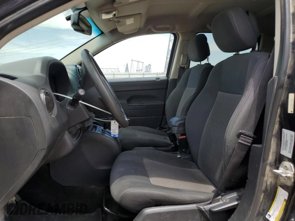 2016 Jeep Compass Sport z VIN 1C4NJCBA5GD543146, wystawiony jako Copart lot #57117905 z przebiegiem 100 569 mil mil oraz Szkoda całkowita • Salvage title. Historia ofert i sprzedaży dostępna na DreamBid. Obrazek 7.