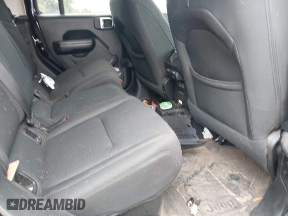 2021 Jeep Gladiator Sport S with VIN 1C6JJTAM7ML554412, listed as a IAAI auction lot 42199167 with 74,263 mi miles and . Bid and sale history available at DreamBid. Image 8.