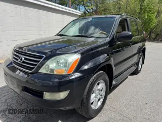 2005 Lexus GX 470 with VIN JTJBT20X050079831, listed as a Copart auction lot 56405105 with 390,415 mi miles and Clean Title. Bid and sale history available at DreamBid. Image 2.