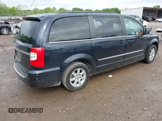 2011 Chrysler Town & Country Touring with VIN 2A4RR5DG7BR641411, listed as a IAAI auction lot 42090973 with 158,298 mi miles and . Bid and sale history available at DreamBid. Image 4.