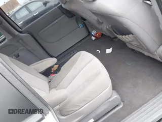 2012 Kia Sedona LX with VIN KNDMG4C72C6485952, listed as a IAAI auction lot 42029147 with 129,296 mi miles. Bid and sale history available at carsss.com. Image 8.