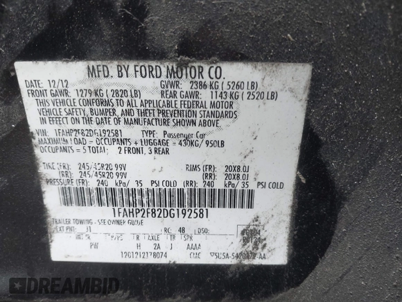 2013 Ford Taurus Limited with VIN 1FAHP2F82DG192581, listed as a IAAI auction lot 41490122 with 196,515 mi miles. Bid and sale history available at carsss.com. Image 9.