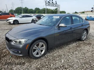 2018 BMW 3 Series 330i xDrive with VIN WBA8D9C56JEB35605, listed as a Copart auction lot 62752165 with 75,300 mi miles and Salvage title. Bid and sale history available at DreamBid. Image 1.
