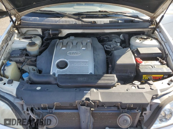 2005 Kia Sedona LX with VIN KNDUP132056685525, listed as a Copart auction lot 77790354 with 60,985 mi miles and Salvage Title. Bid and sale history available at carsss.com. Image 12.