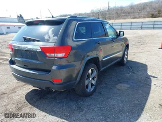 2011 Jeep Grand Cherokee Laredo with VIN 1J4RR4GT0BC543283, listed as a IAAI auction lot 41890109 with 123,325 mi miles. Bid and sale history available at carsss.com. Image 4.